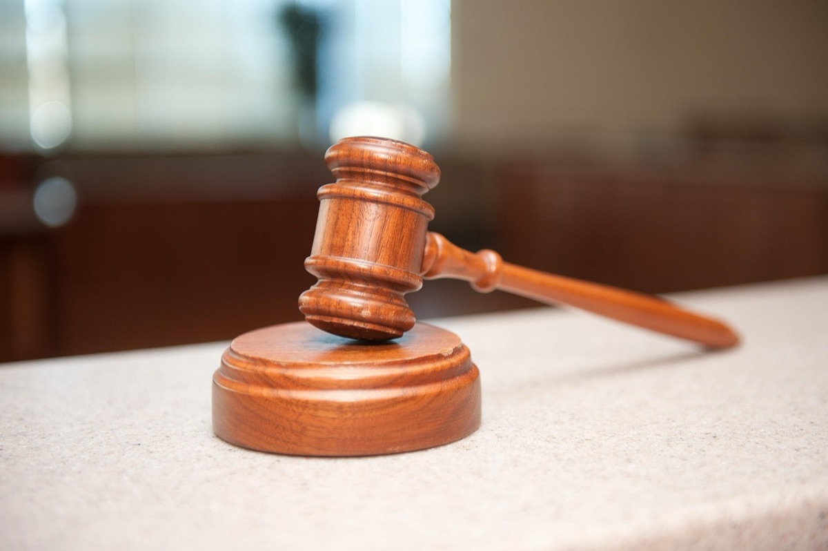 Canadian lawyer holding legal document